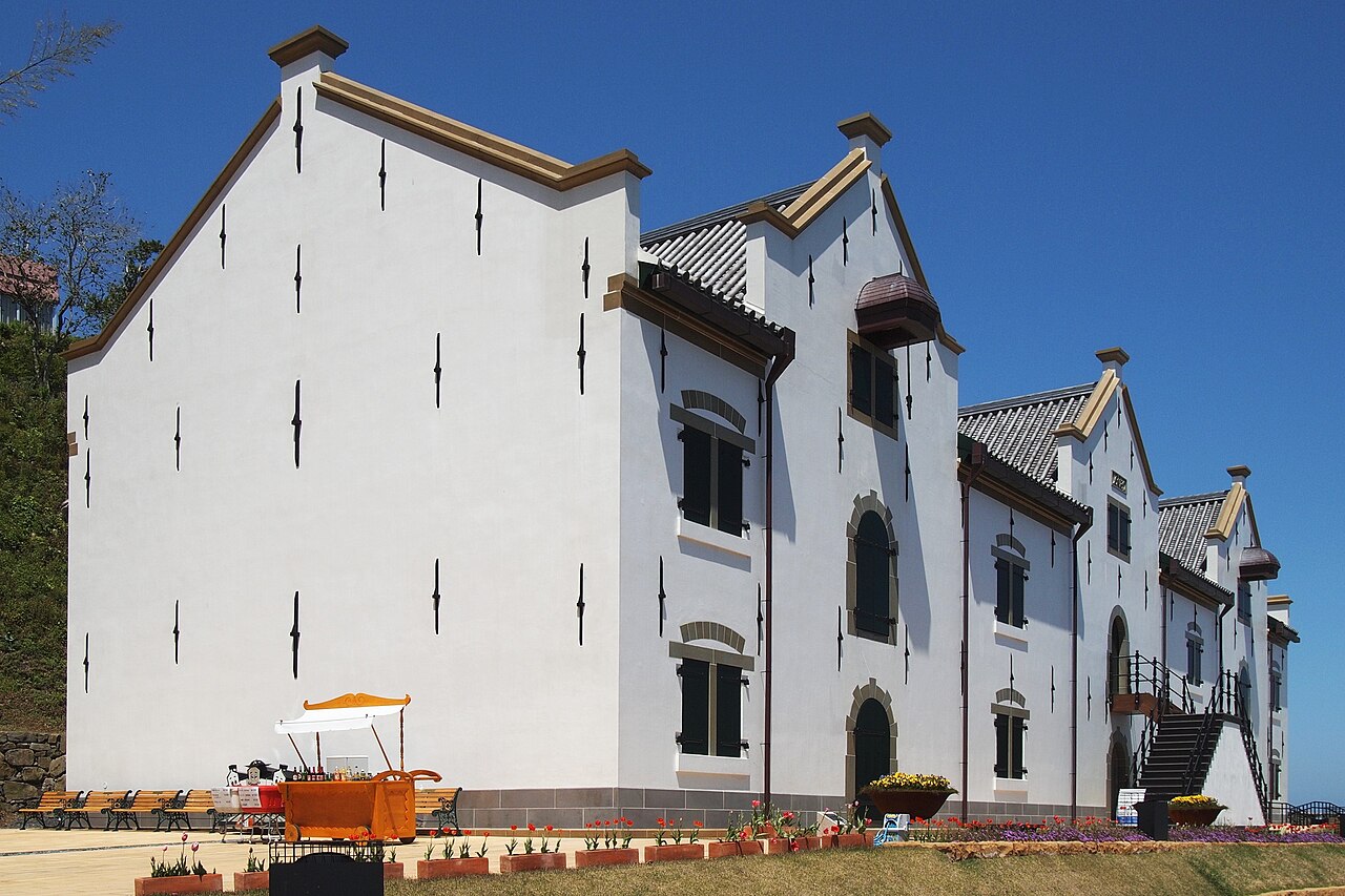 The white-walled Dutch Trading Post warehouse in Hirado under a blue sky