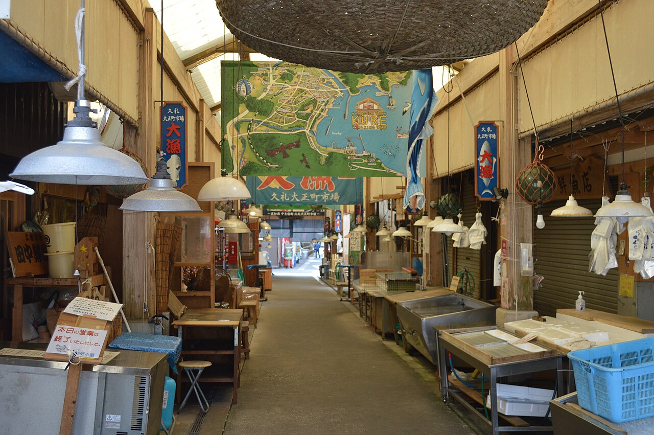 Stalls and hanging lamps inside the covered lane of Taisho-machi Market