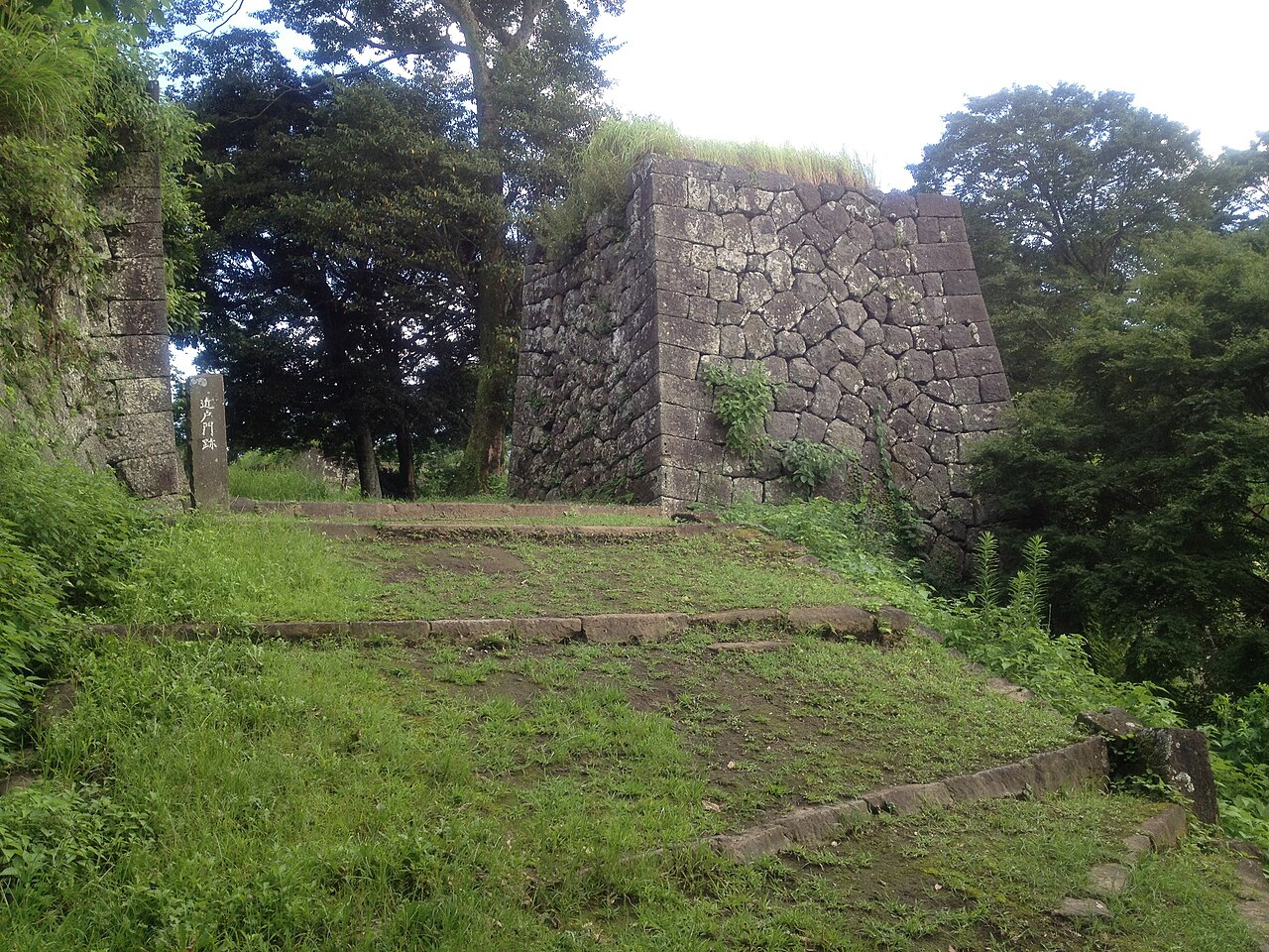 Stone walls and stone steps at a gate site of Oka Castle Ruins