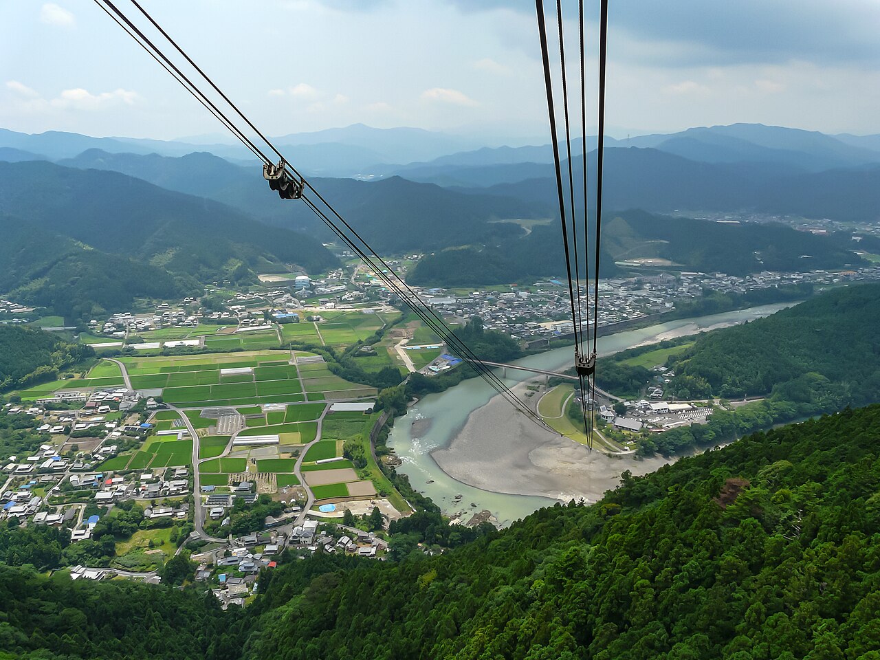 The Tairyuji gondola looking down on the Naka River and a small village in the valley below