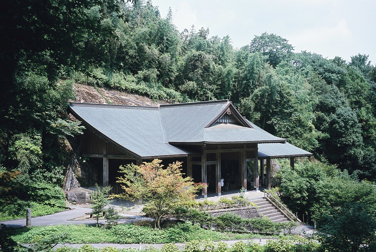 A sheltering roof built over one of the carved Buddha groups at the Usuki stone Buddha site